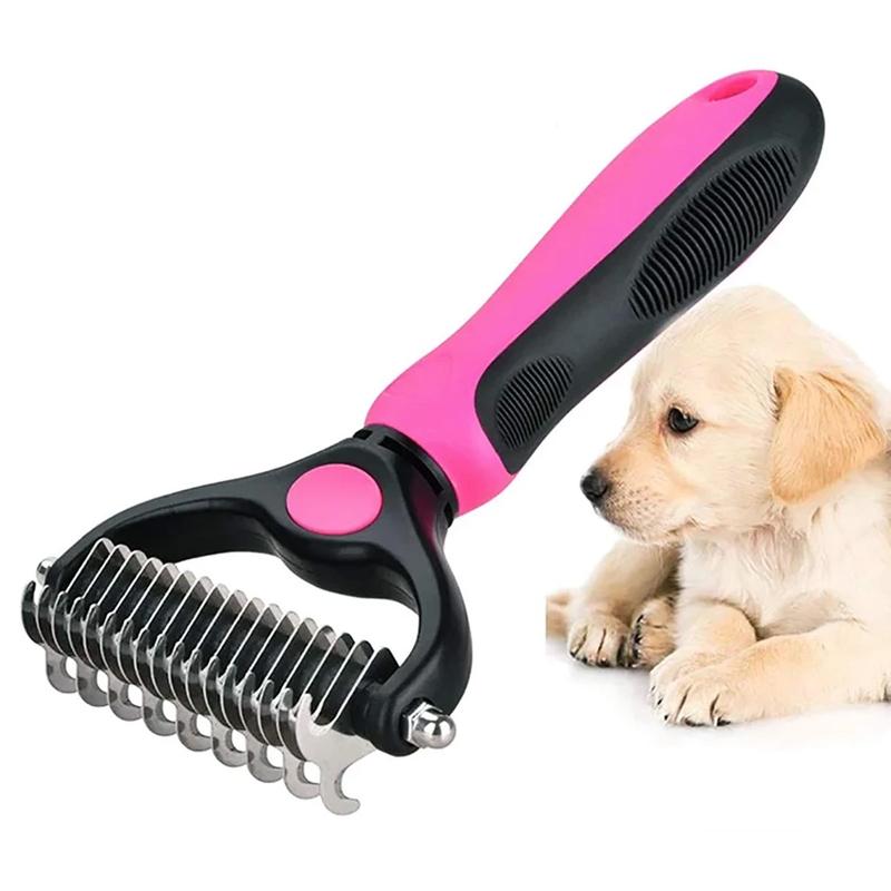 Pink and black grooming rake displayed beside a puppy