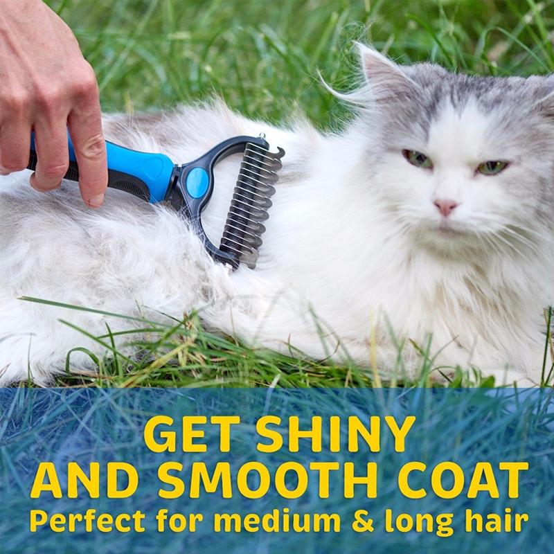 Blue pet grooming rake being used on a long-haired white cat