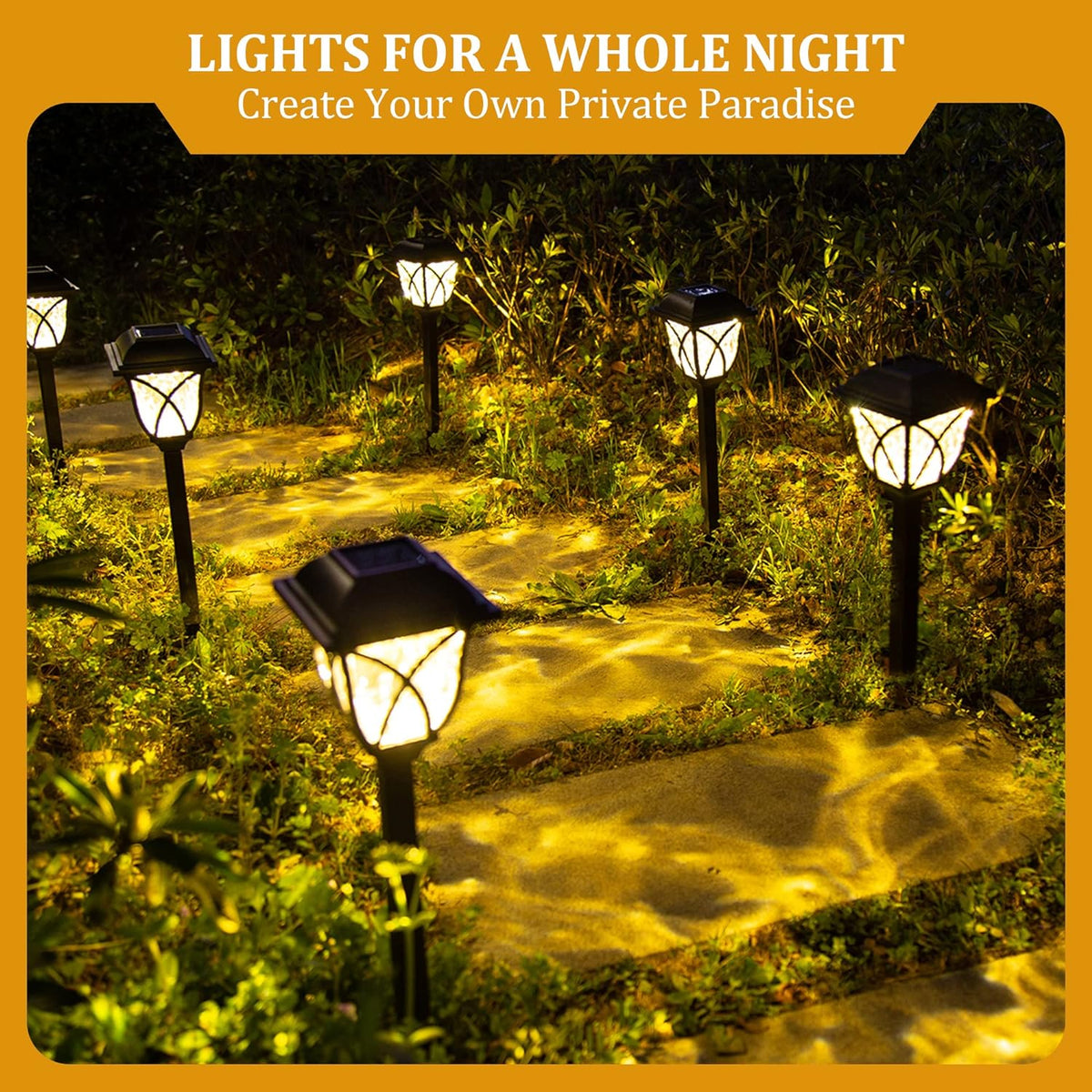 Illuminated pathway lights spaced beside garden plants
