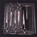 Silver dog grooming scissors and comb arranged in a black zip case