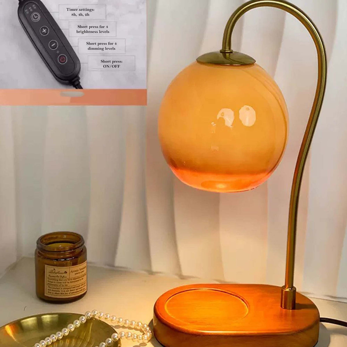 Orange wax melt lamp with a curved stand and an inset showing timer and brightness controls