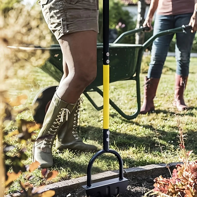 Manual lawn edger used to define a landscaped garden border