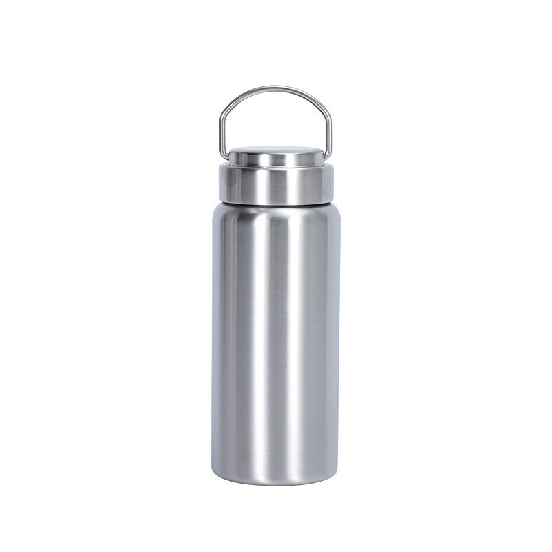 Side view of a stainless steel bottle with its carry-loop lid closed