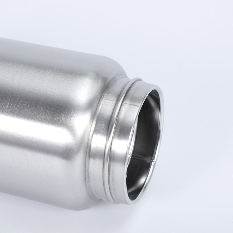 Close-up of the threaded opening on a stainless steel water bottle