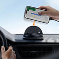Hand placing a phone horizontally onto a black dashboard holder