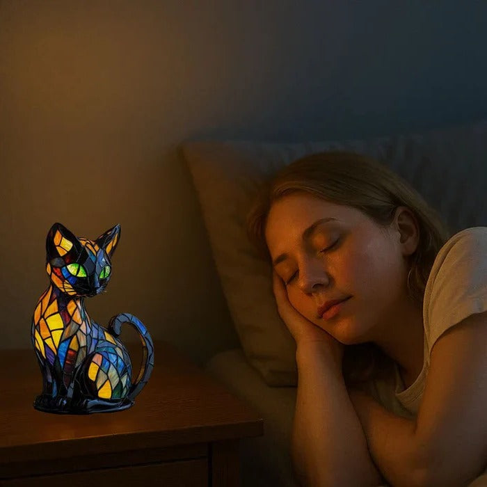 Glowing cat-shaped lamp placed on a bedside table