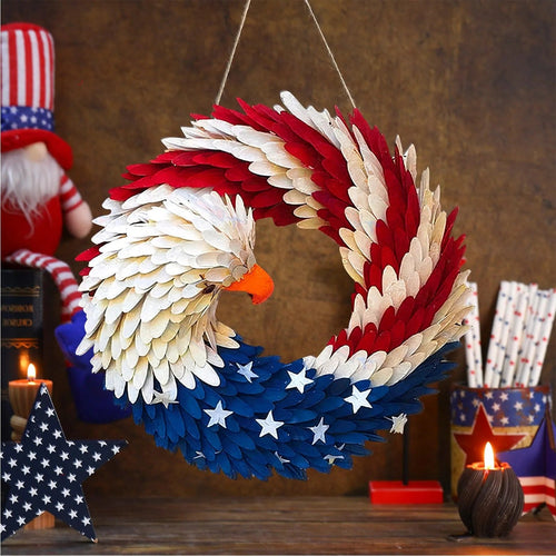 Red, white, and blue eagle wreath hanging beside patriotic decorations