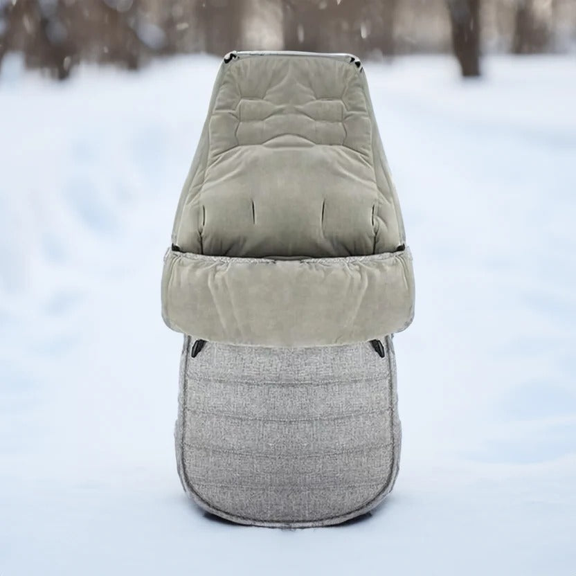 Gray stroller footmuff with a soft lining and folded front cover